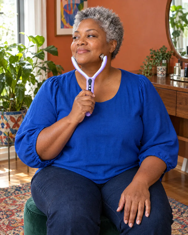 AI-created lifestyle illustration of an adult using the Purple facial roller.
