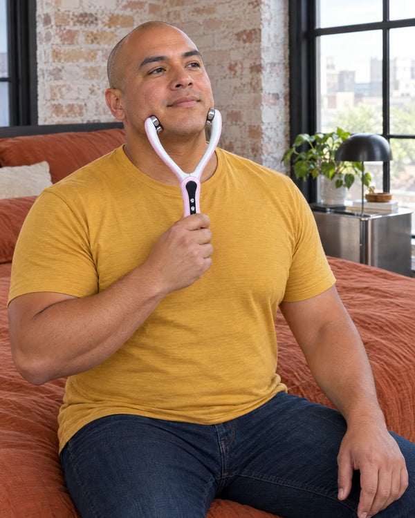 AI-created lifestyle illustration of an adult using the Pink facial roller.