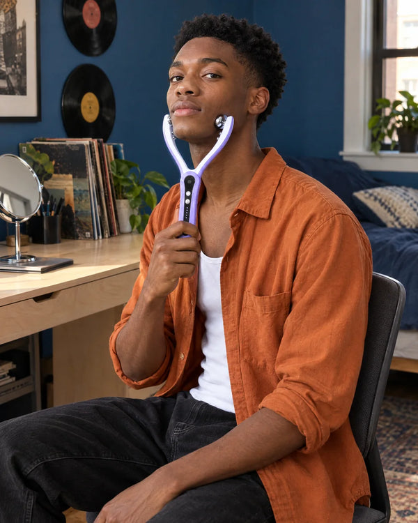AI-created lifestyle illustration of an adult using the Purple facial roller.