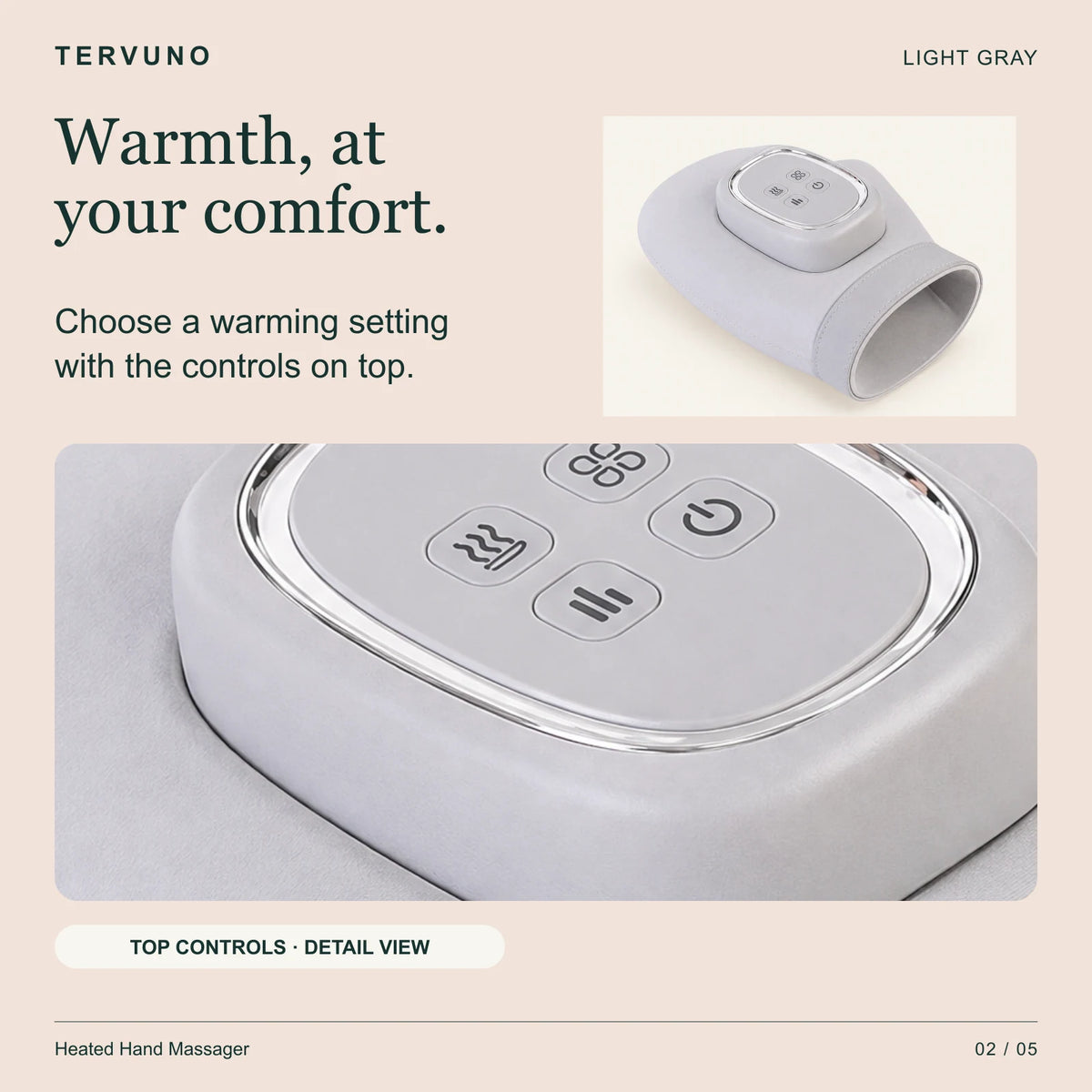 Close-up of the hand massager top controls for warmth settings