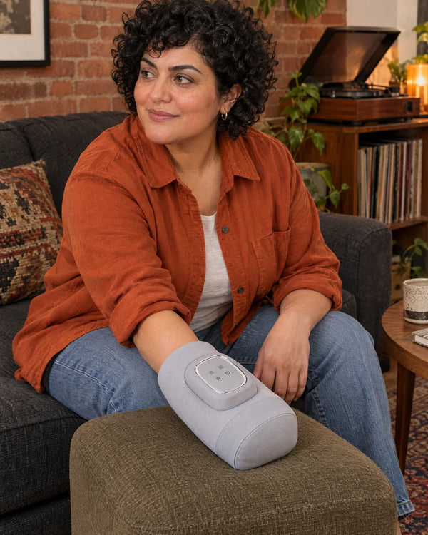 AI-created lifestyle illustration of an adult using the Light Gray hand massager.